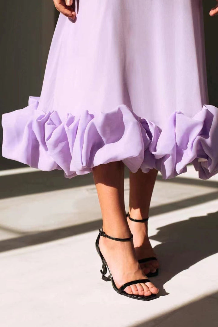 Lora - Vestido Midi Volante en Ruedo